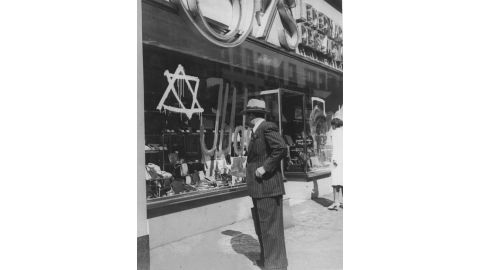 Before they had to give up their businesses, Jewish merchants in the Nazi era had to mark their stores with a Star of David and word Juden, which means "Jews."
