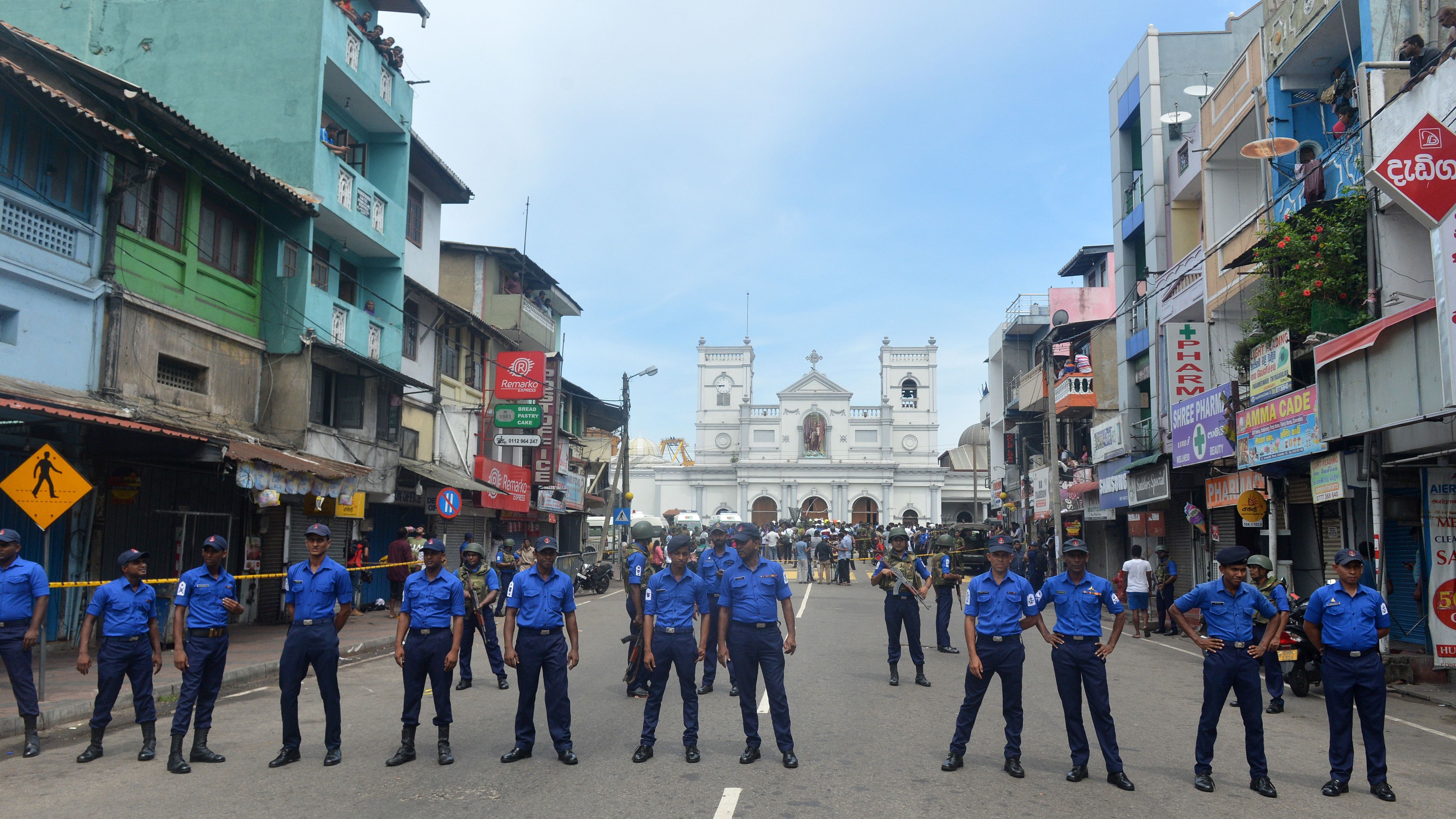Sri Lankan security personnel keep watch outside St. Anthony's Shrine. 