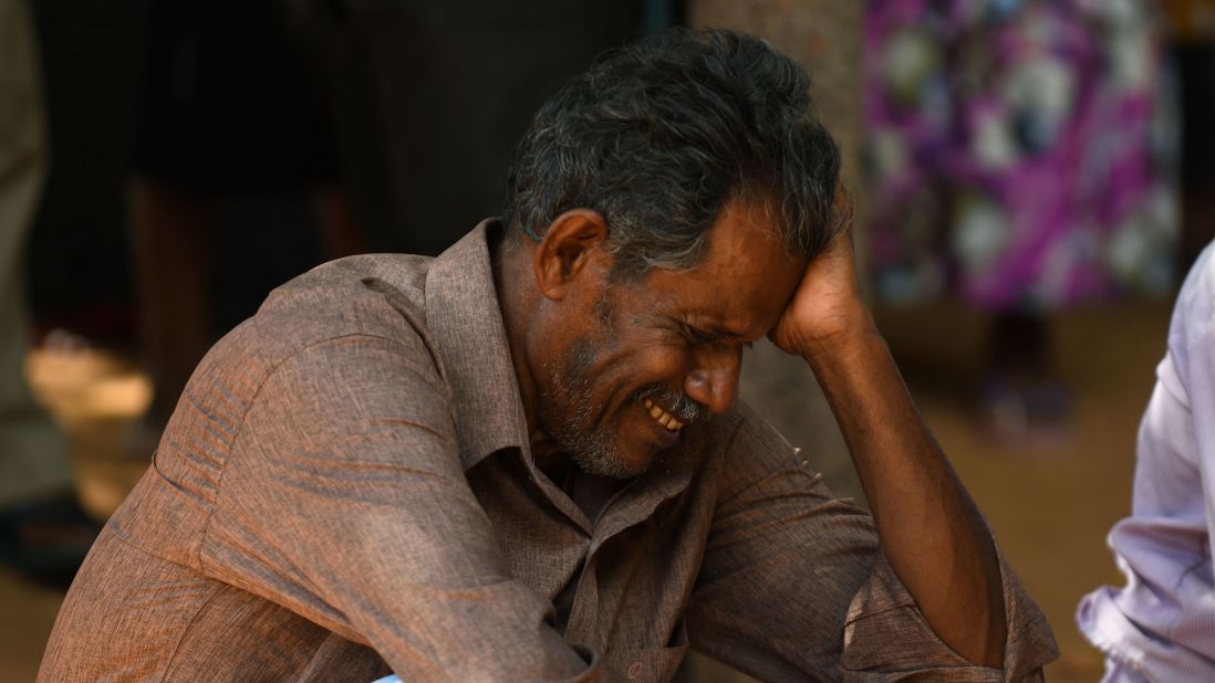 A bombing victim's relative weeps outside a hospital in Batticaloa, eastern Sri Lanka.