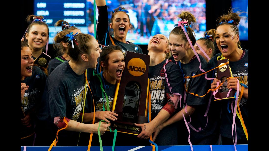 The team from the University of Oklahoma celebrates after winning the NCAA college women's gymnastics championship on Saturday, April 20, in Fort Worth, Texas.