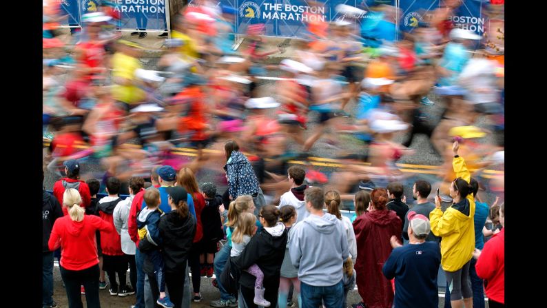 Fans cheer on the third wave of runners at the start of the 123rd Boston Marathon on Monday, April 15, in Hopkinton, Massachusetts.