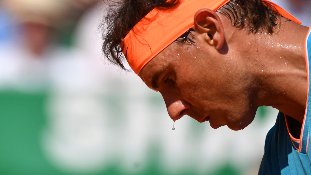 Sweat drips from the nose of Spain's Rafael Nadal during his tennis match against fellow Spaniard Roberto Bautista Agut on Wednesday, April 17, in Monaco.