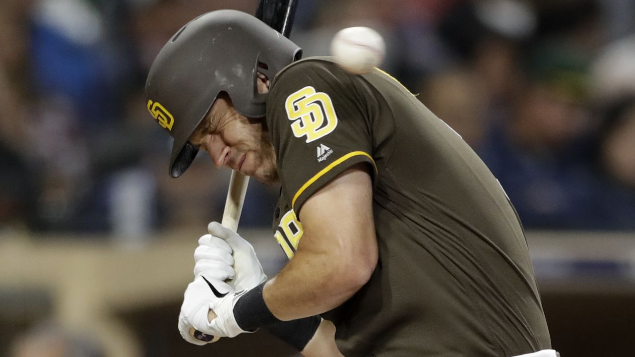 San Diego Padres' Ian Kinsler dodges an inside pitch during the fifth inning of a baseball game against the Cincinnati Reds in San Diego on Friday, April 19.
