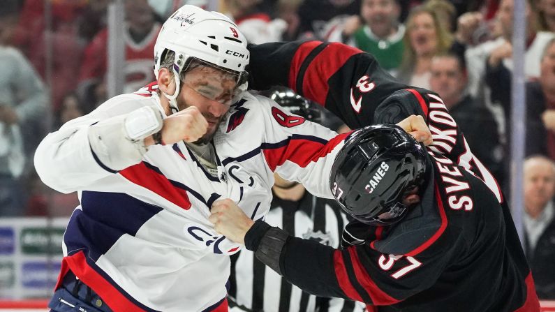 Alex Ovechkin of the Washington Capitals, left, and Andrei Svechnikov of the Carolina Hurricanes fight during Game 3 of their first-round playoff series on Monday, April 15 at PNC Arena in Raleigh, North Carolina. Ovechkin knocked out Skevchnikov during the fight, who had to leave the game and <a href="index.php?page=&url=https%3A%2F%2Fbleacherreport.com%2Farticles%2F2831518-video-capitals-alex-ovechkin-knocks-out-hurricanes-andrei-svechnikov-in-fight" target="_blank" target="_blank">enter the NHL's concussion protocol</a>.