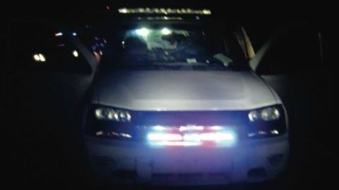 The 2007 white Chevrolet Trailblazer that attempted to pull over an undercover detective. 