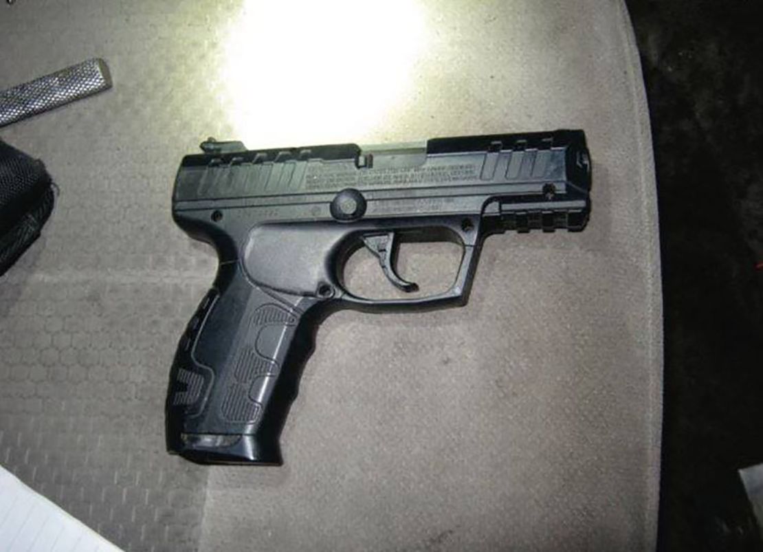 The realistic-looking airsoft pistol found in the fake deputy's vehicle.