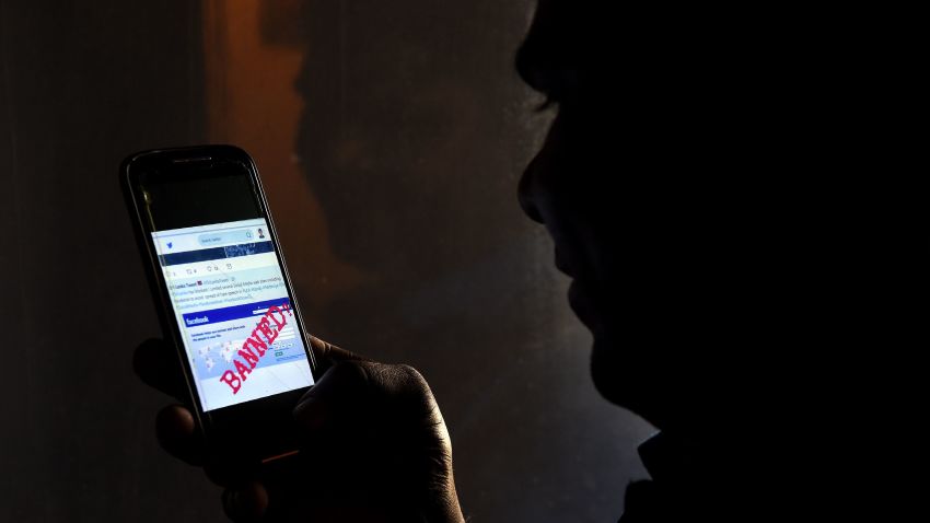A Sri Lankan man mobile phone user shows an image on Twitter showing that the Facebook site had been blocked in Colombo on March 7, 2018. - Telecommunication service providers said they have blocked access to facebook and several other social media platforms on the directive of the government which accused extremists of using the popular social media to spread hate speech and instigate violence against the Muslim minority in the country. (Photo by ISHARA S. KODIKARA / AFP)        (Photo credit should read ISHARA S. KODIKARA/AFP/Getty Images)