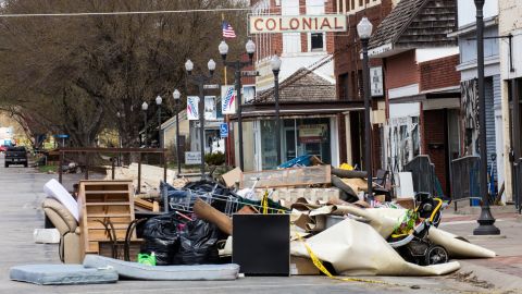 Flood-damaged belongings are piled on the streets of Hamburg as the town tries to clean up.