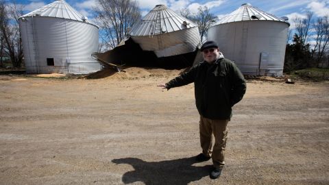Hamburg resident John Davis shows how high the water rose in this year's floods.
