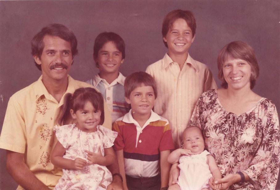 Gabbard, lower left, poses for a family portrait in 1984. She is the fourth of five children.