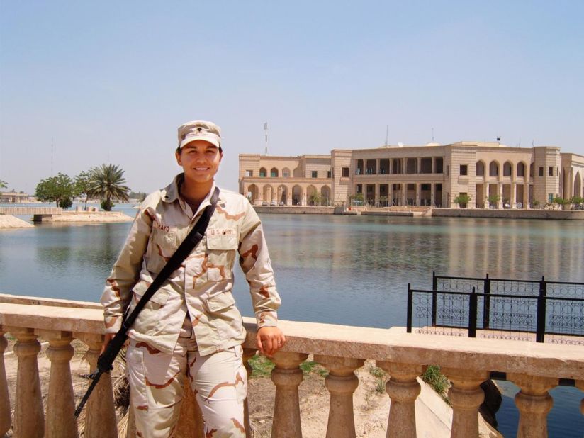 Gabbard poses in front of the Al-Faw Palace in Baghdad, Iraq, in 2005.