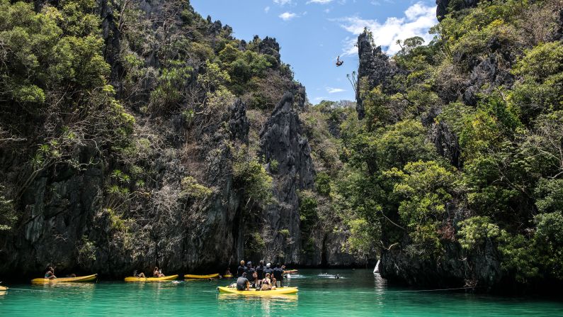 <strong>Palawan Philippines:</strong> On Miniloc Island, Briton Blake Aldridge dives from a precipice during the Red Bull Cliff Diving World Series held in April. 