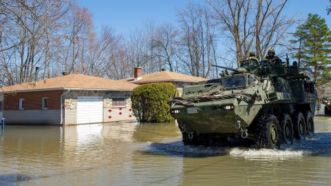 The Canadian Armed Forces navigate floodwaters in Rigaud in the suburbs of Montreal, Quebec. 