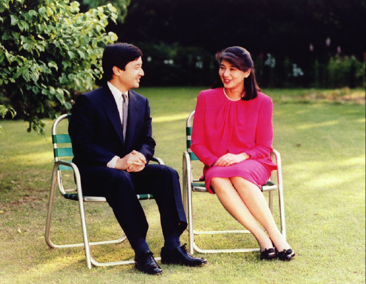 Naruhito chats with his fiancee, Masako Owada, in June 1993. Like his father, Naruhito married a commoner. Masako previously worked as a diplomat.