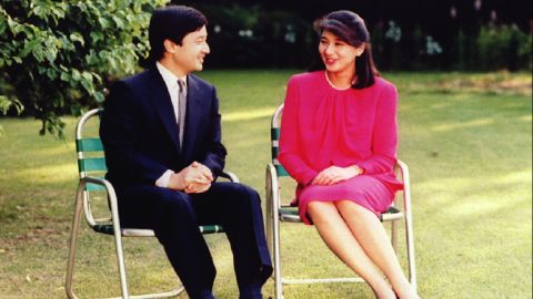 Japan's Crown Prince Naruhito chats with his then-fiancee Masako Owada, former career diplomat, in the garden of Togu Palace in Tokyo ahead of their 1993 wedding.