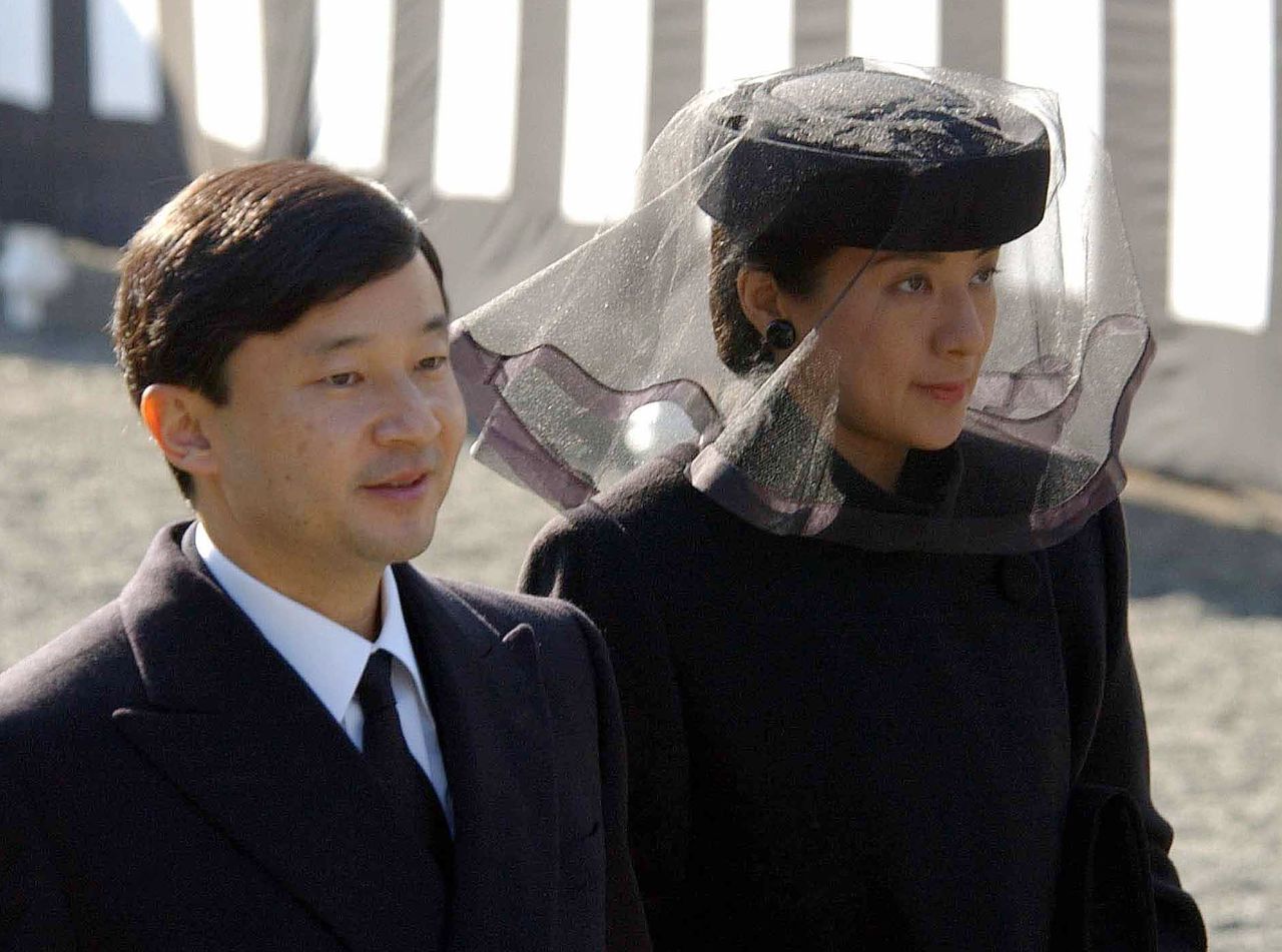 Naruhito and Masako attend the funeral of Akihito's cousin, Prince Takamado, in November 2002.
