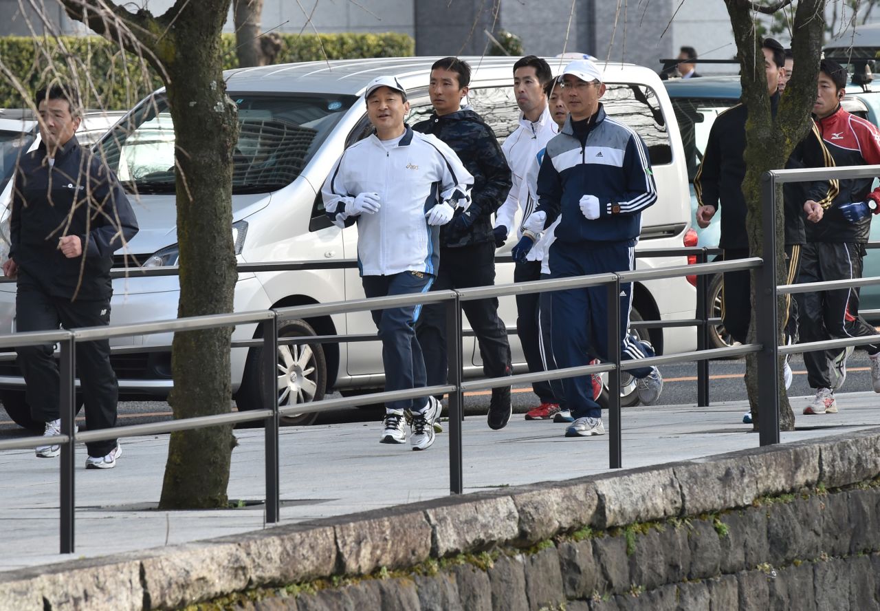 Naruhito jogs around the Imperial Palace in Tokyo in February 2015.