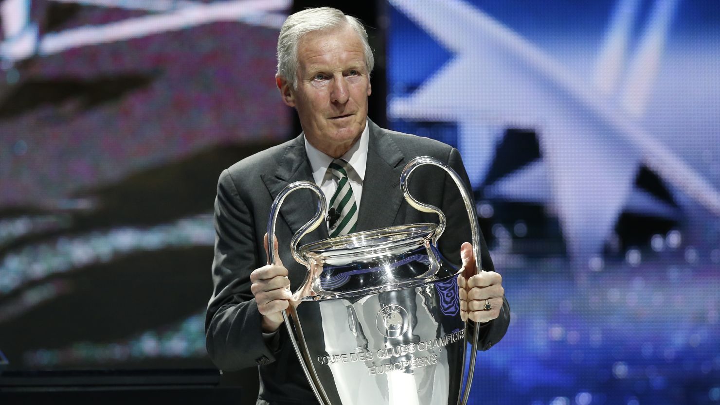 Billy McNeill  with the Champions League trophy during the 2013-14 Champions League group stage draw.
