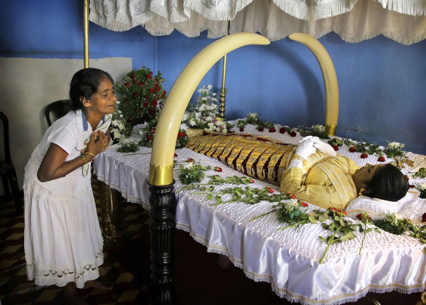 On Tuesday, April 23, Harshani Sriyani weeps over the body of her daughter who was killed in the Easter Sunday bombings in Colombo.