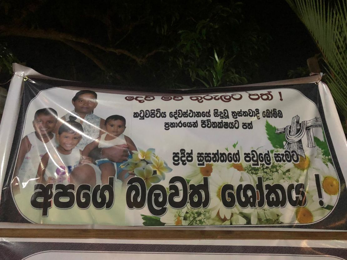 Posters with photos of blast victims are seen outside St Sebastian Church in Negombo. This one reads, 'Rest in peace for Pradeep Susanthas and his whole family, who were killed in the church attack. Our deepest sympathies.'