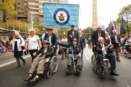 War veterans make their way down Elizabeth Street during the Anzac Day parade on April 25, 2018 in Sydney, Australia.