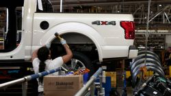 An employee works on the assembly line for the Ford 2018 and 2019 F-150 truck at the Ford Motor Company's Rouge Complex on September 27, 2018 in Dearborn, Michigan. - Ford Motor Company's Rouge complex is the only one in American history to manufacture vehicles  including ships, tractors and cars  non-stop for 100 years. (Photo by JEFF KOWALSKY / AFP)        (Photo credit should read JEFF KOWALSKY/AFP/Getty Images)