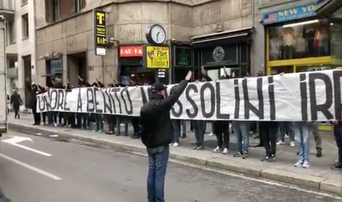 Lazio fans hold a banner that reads "Honor to Benito Mussolini" in Milan.