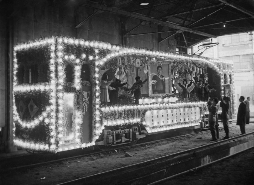 A tram decorated with lights to celebrate the royal wedding.