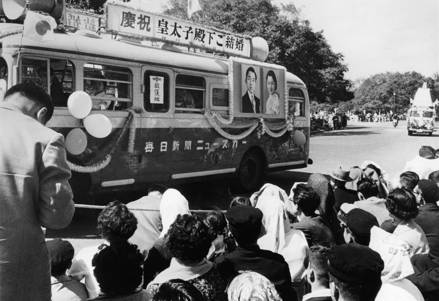 A first aid bus decorated with photos of the royal couple.