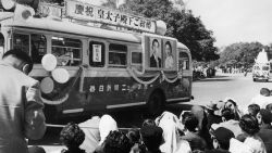 A First Aid bus with pictures of Japan's Crown Prince Akihito and his spouse Michiko Shoda celebrates their wedding on April 1959.