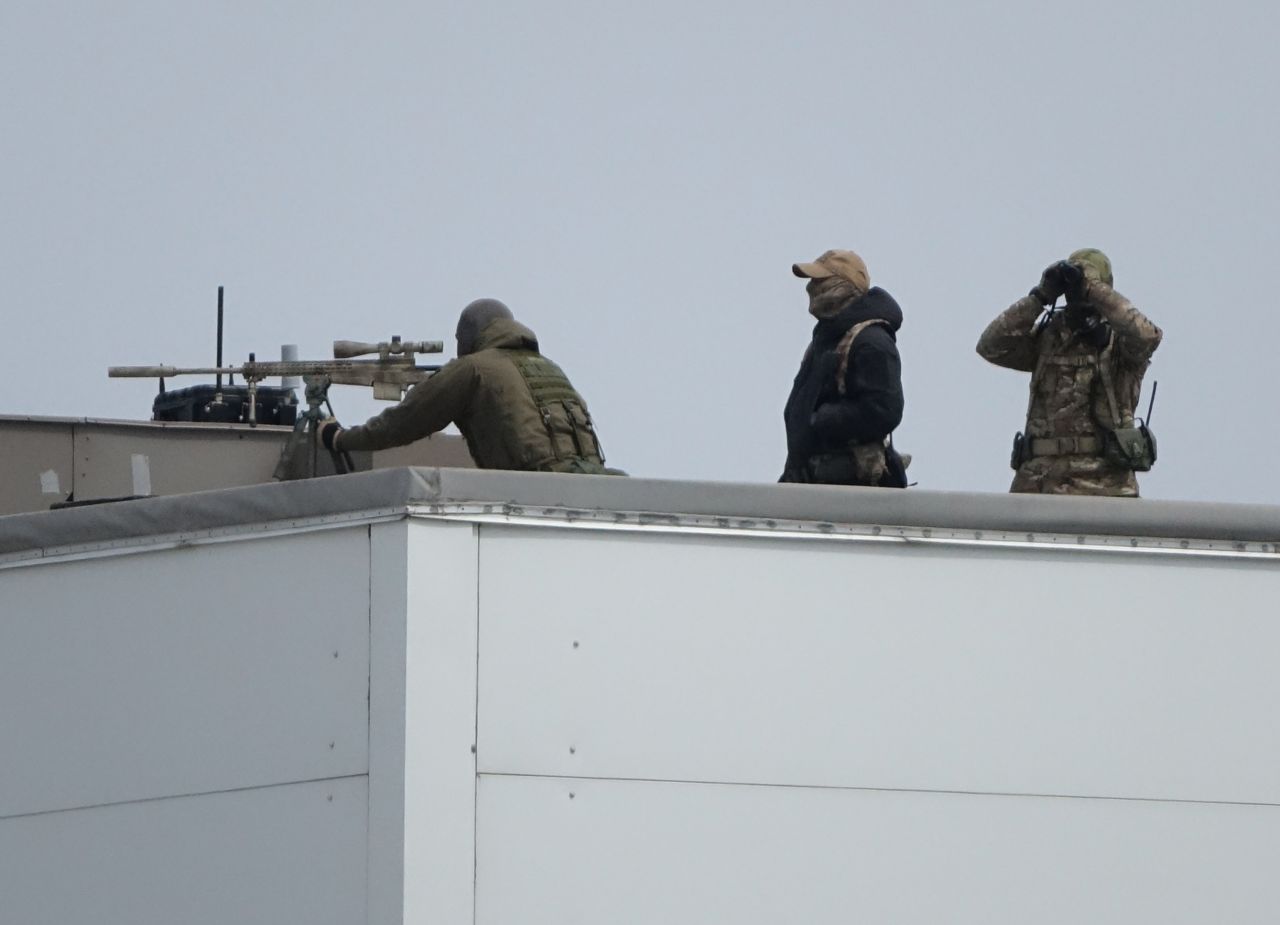 Snipers are deployed on the roof of the Sports Center of Far Eastern Federal University in  Vladivostok, Russia, ahead of the summit between North Korean leader Kim Jong Un and Russian President Vladimir Putin, on Thursday, April 25.