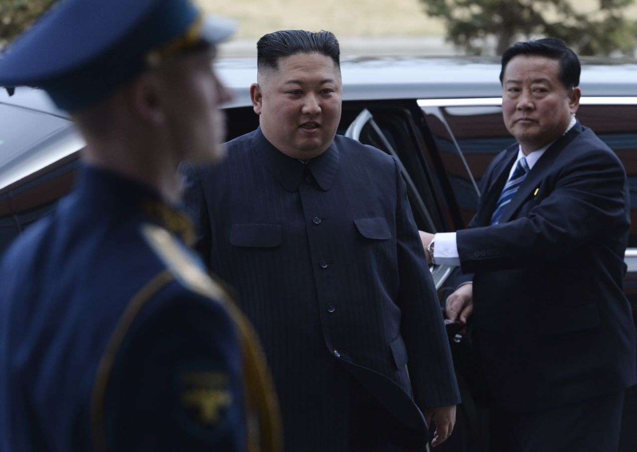 North Korean leader Kim Jong Un gets out of a car as he arrives for a meeting with Russian President Vladimir Putin at the Far Eastern Federal University campus on Russky Island in Vladivostok, Russia.