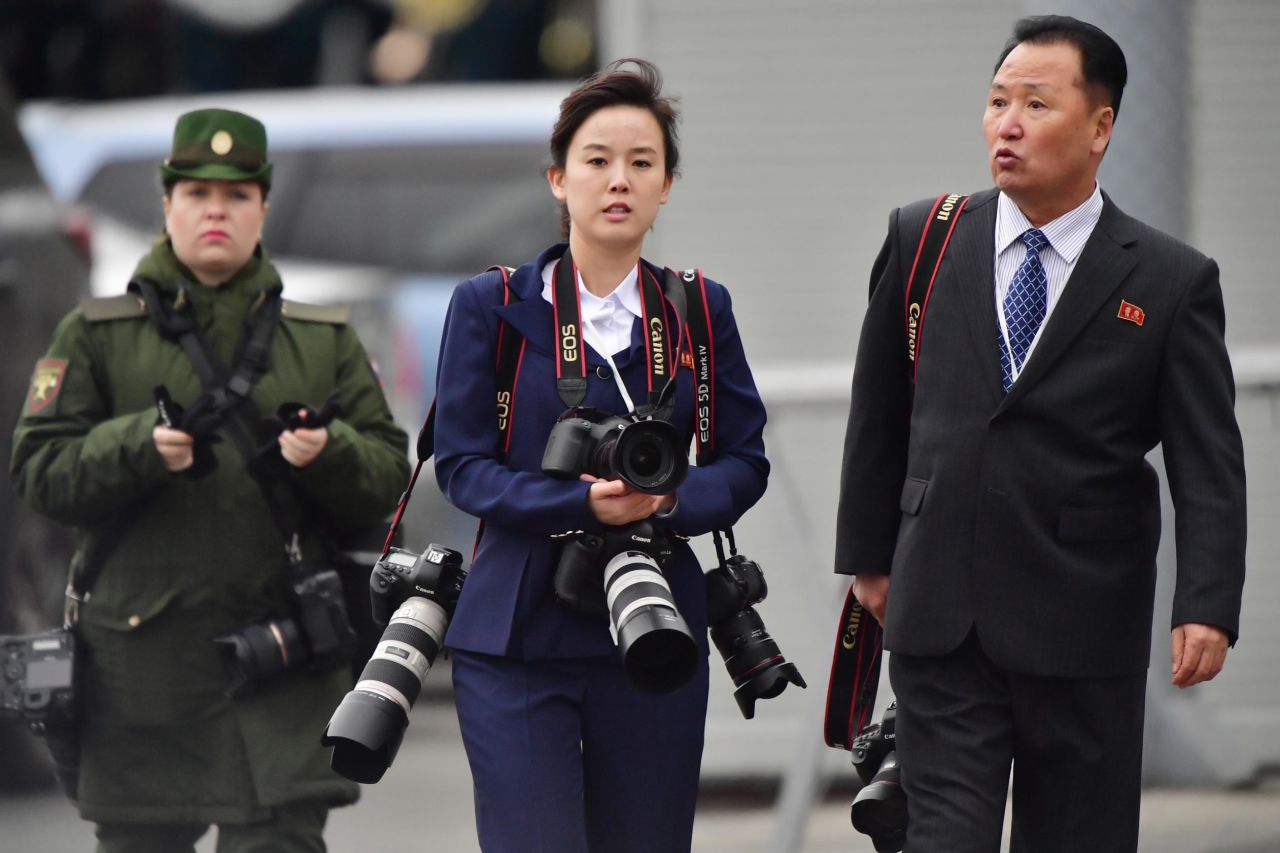 Journalists of the North Korean leader pool are seen at a railway station in Vladivostok during North Korean leader Kim Jong Un's visit. 
