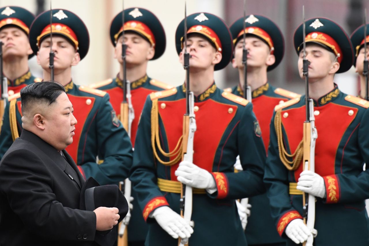 North Korean leader Kim Jong Un walks past honor guards during a welcoming ceremony upon arrival at the railway station in the far eastern Russian port of Vladivostok on Wednesday April 24.
