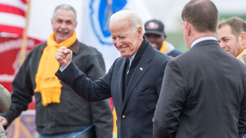DORCHESTER, MA - APRIL 18: Former Vice President Joe Biden reacts in front of a Stop & Shop following a speech in support of striking union workers on April 18, 2019 in Dorchester, Massachusetts. Thousands of unionized Stop & Shop workers across New England walked off the job last week in an ongoing strike in response to a proposed contract which the United Food & Commercial Workers union says would cut health care benefits and pensions for employees. (Photo by Scott Eisen/Getty Images)