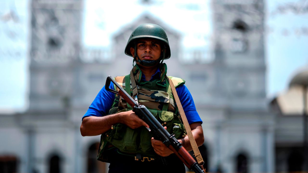 A soldier stands guard outside St. Anthony's Shrine in Colombo, one of the Easter Sunday targets.
