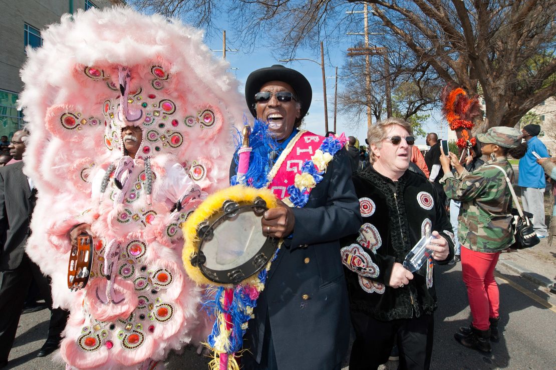 Quint Davis, Jazz Fest's executive producer, participates in a second-line parade in 2015.