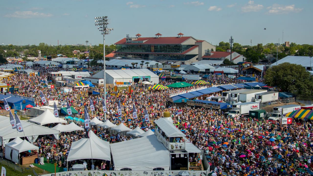 Crowds fill the Fair Grounds Race Course in 2017 for the New Orleans Jazz & Heritage Festival.