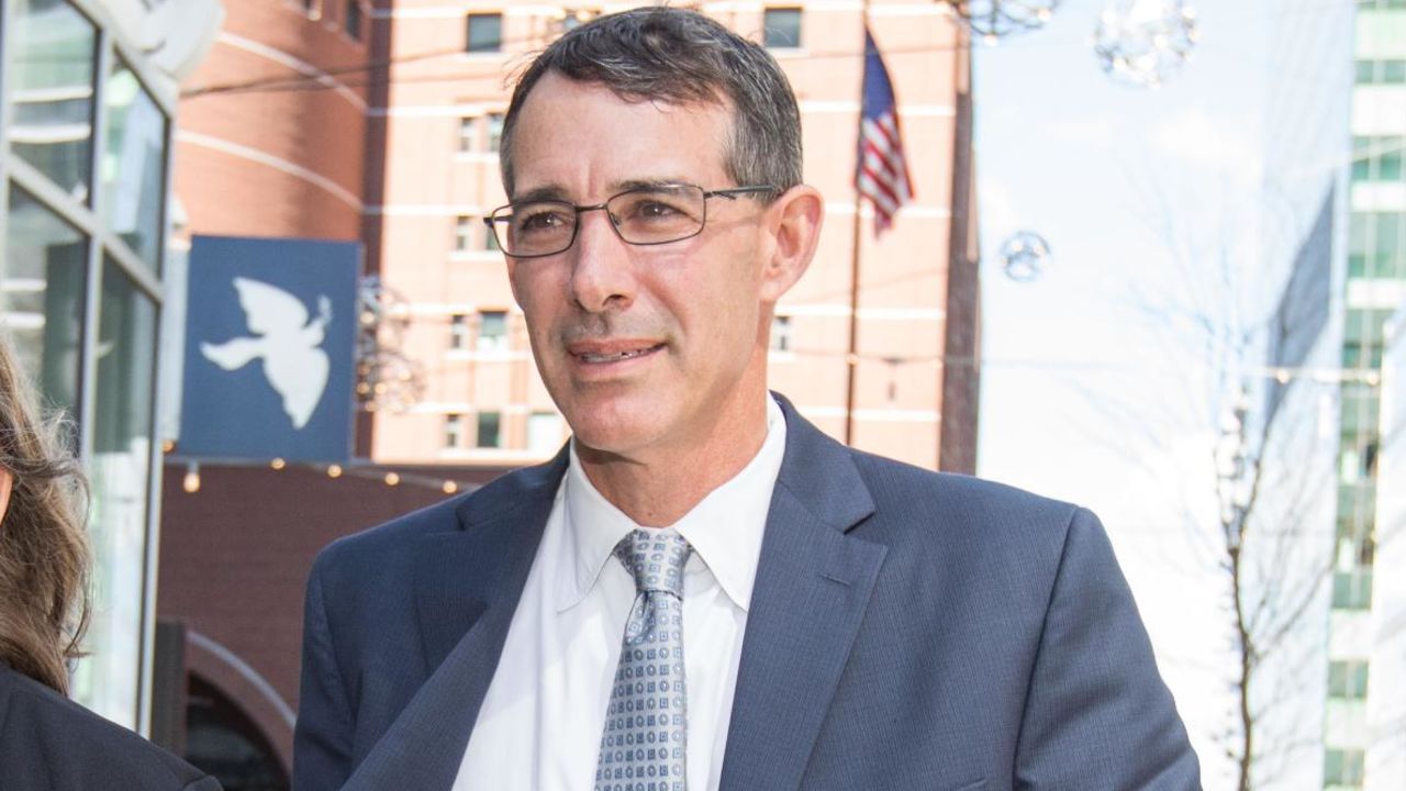 Michael Center, former men's tennis coach for UT Austin, leaves court on April 24, 2019 in Boston, Massachusetts.