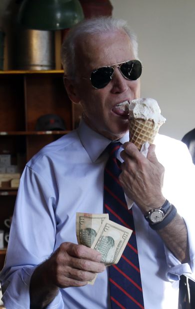 Biden gets ready to pay for an ice cream cone in Portland, Oregon, in October 2014. He was in Portland campaigning for US Sen. Jeff Merkley.