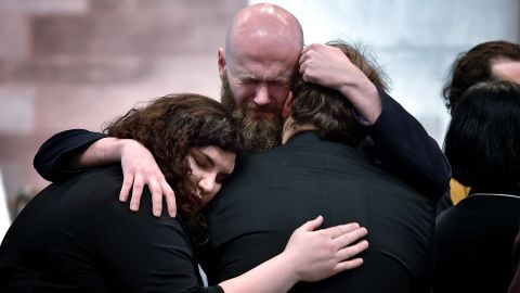 Friends of murdered journalist Lyra McKee console one another at <a href="https://www.cnn.com/2019/04/24/uk/lyra-mckee-funeral-intl/index.html" target="_blank">her funeral</a> in Belfast, Northern Ireland, on Wednesday, April 24. McKee, 29, was fatally shot by the New IRA while reporting on rioting last week in Londonderry, Northern Ireland. The prominent freelance journalist had written for publications including The Atlantic and Buzzfeed News.