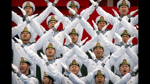 A Chinese Navy chorus sings at a concert in Qingdao, China, that featured various military bands on Monday, April 22.
