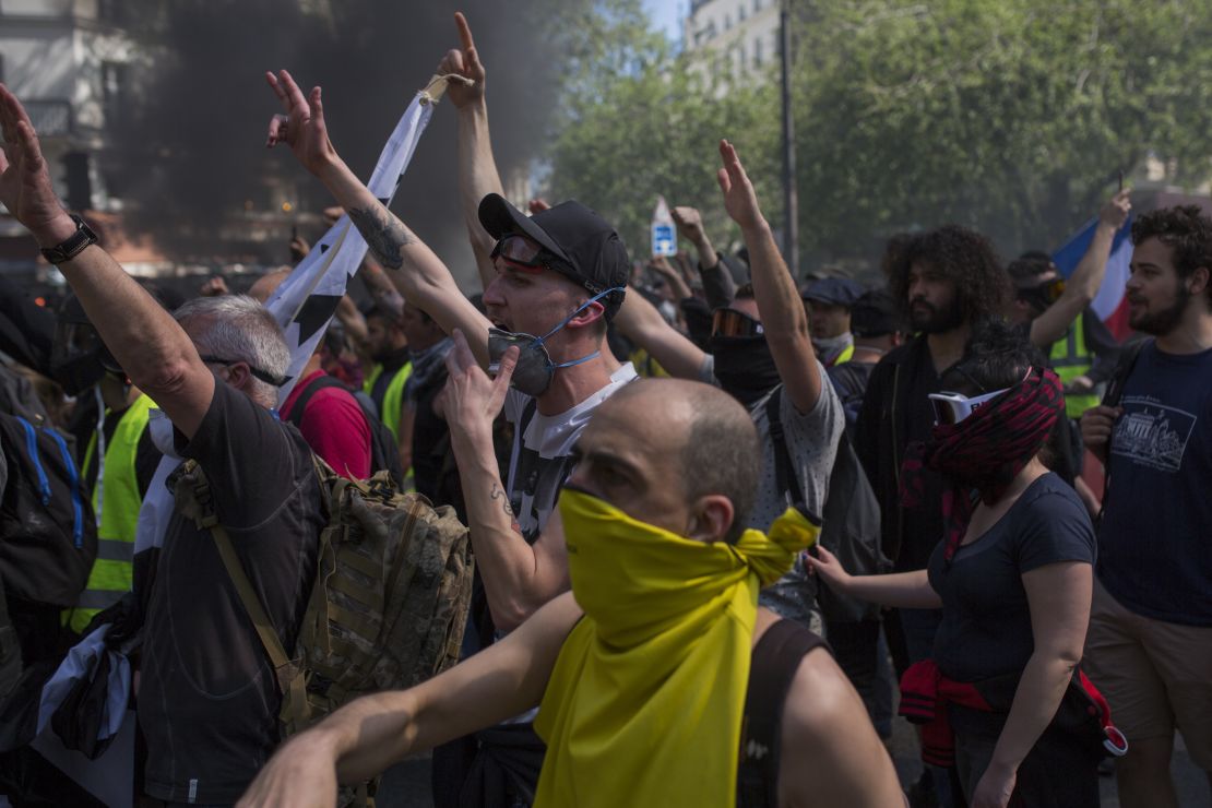Yellow Vest protesters march during a demonstration on April 20 in Paris.