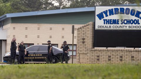 DeKalb County School District police investigate the shooting at the elementary school Thursday in Stone Mountain, Georgia.