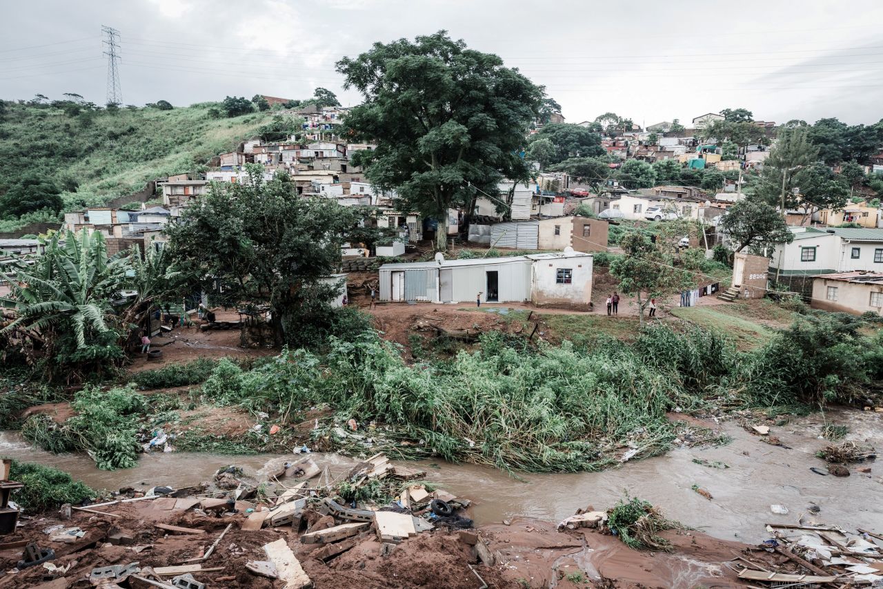 People abandon their homes at an informal settlement of BottleBrush, south of Durban, on April 23. 
