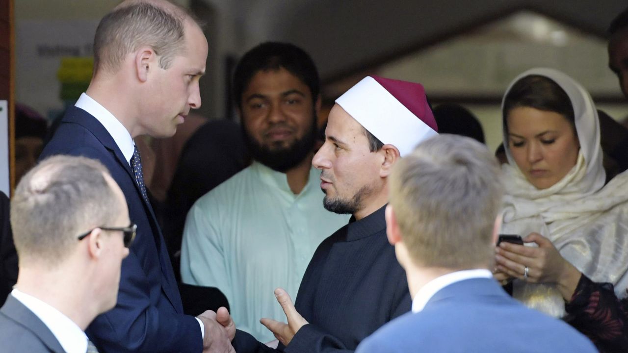 Britain's Prince William, top left, is farewelled by Imam Gamal Fouda after his visit to the Al Noor mosque in Christchurch, New Zealand, Friday, April 26, 2019. Prince William visited the one of the mosques where 50 people were killed and 50 others wounded in a March 15 attack by a white supremacist. (Tracey Nearmy/Pool via AP)