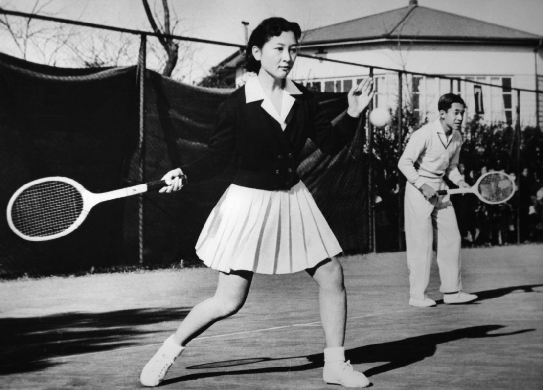 Crown Prince Akihito of Japan and his fiancee Michiko Shoda play tennis at the Tokyo Lawn Tennis Club, on December 6, 1958 in Tokyo, Japan.