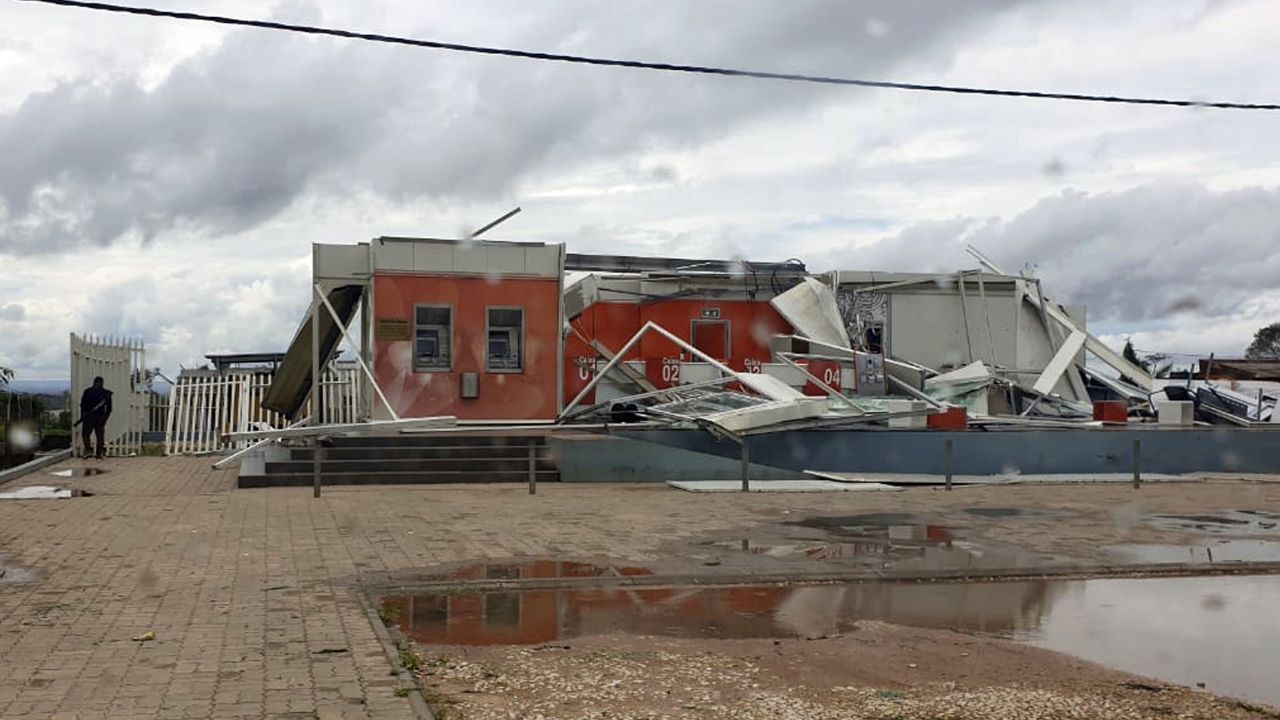 In this photo provided by United Nations Children's Agency (UNICEF), damaged buildings are seen after Cyclone Kenneth made landfall in Pemba, Mozambique,  Friday, April 27, 2019. The second powerful cyclone to strike Mozambique in just six weeks ripped off roofs and killed at least three people on Friday as the United Nations warned of "massive flooding" ahead. (Neidi de Car valho/UNICEF via AP)