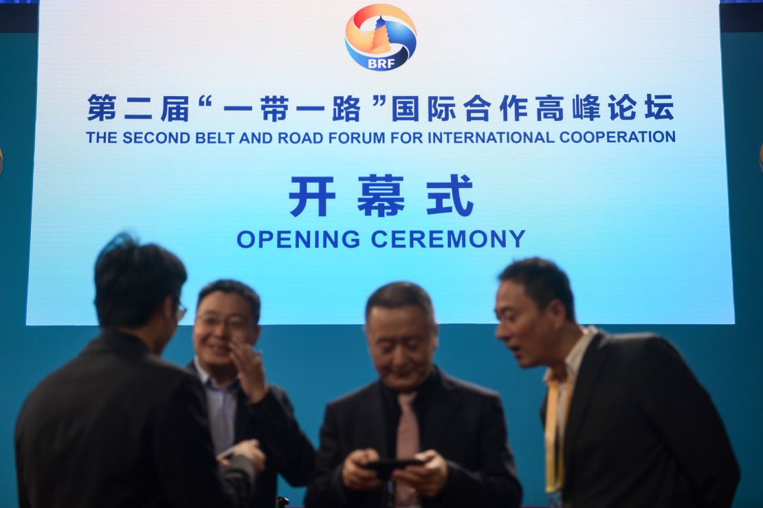 Officials gather near the stage before the opening ceremony of the Belt and Road Forum in Beijing in April 2019.