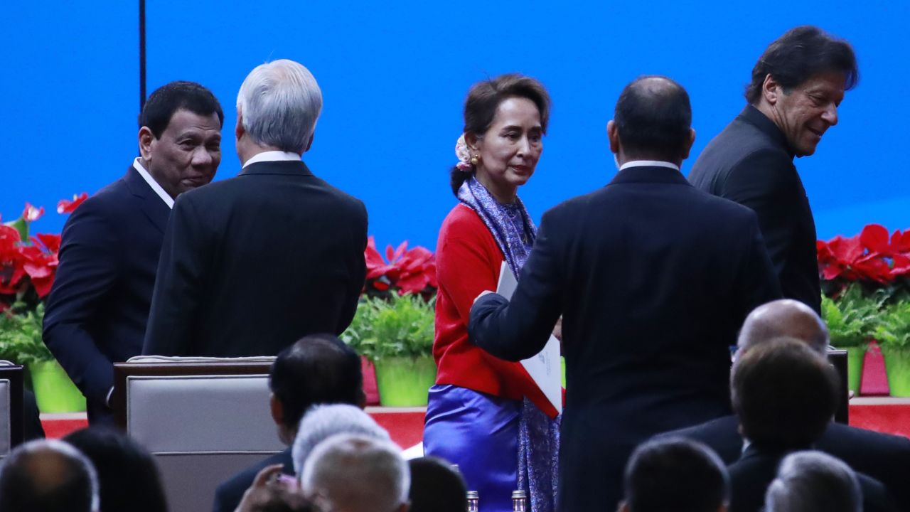 Philippines President Rodrigo Duterte (L), Myanmar State Councilor Aung San Suu Kyi (C) and Pakistani Prime Minister Imran Khan (R) arrive for the opening ceremony on April 26.
